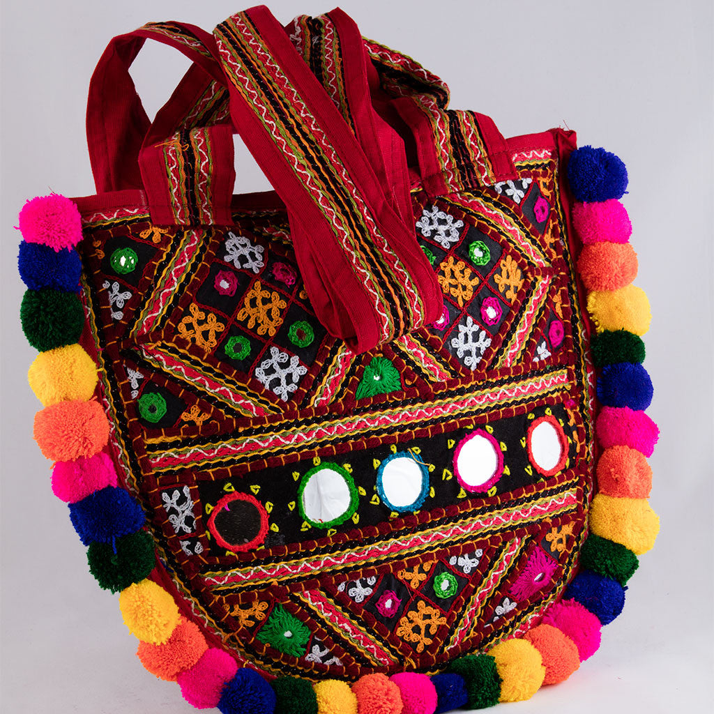Diya Banjara Kutchi embroidered pompom Handbag